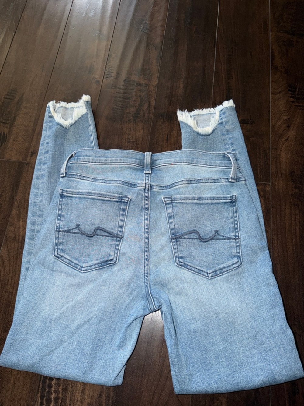 7 For All Mankind Light Blue Cropped Jeans with Frayed Ankles